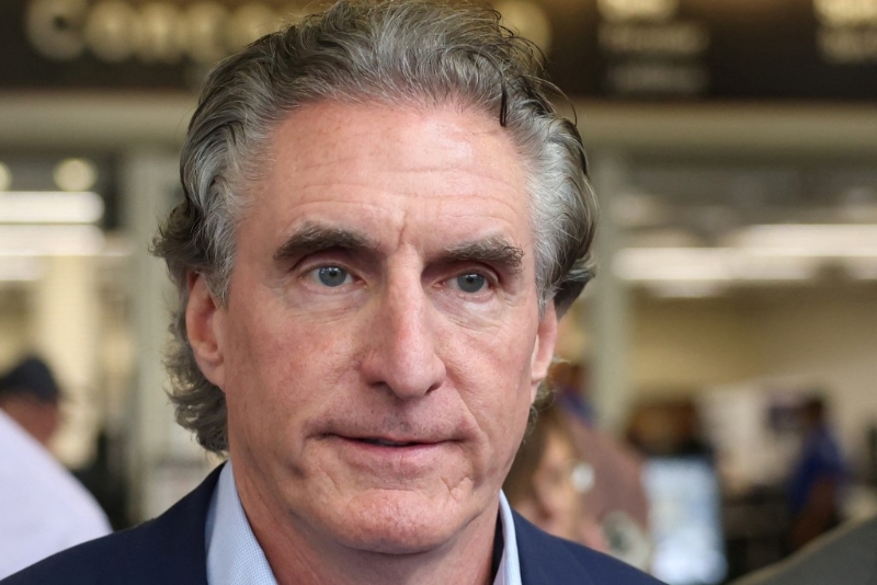 北達科他州州長伯古姆抵達密爾沃基。（路透社）