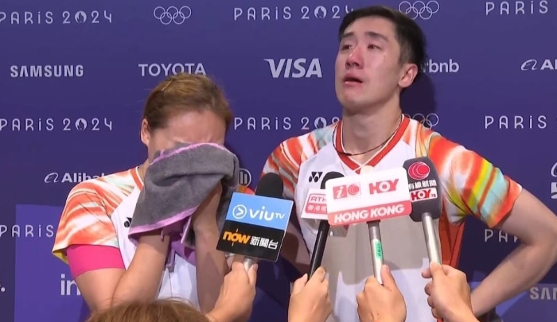 鄧俊文及謝影雪賽后帶淚受訪。
