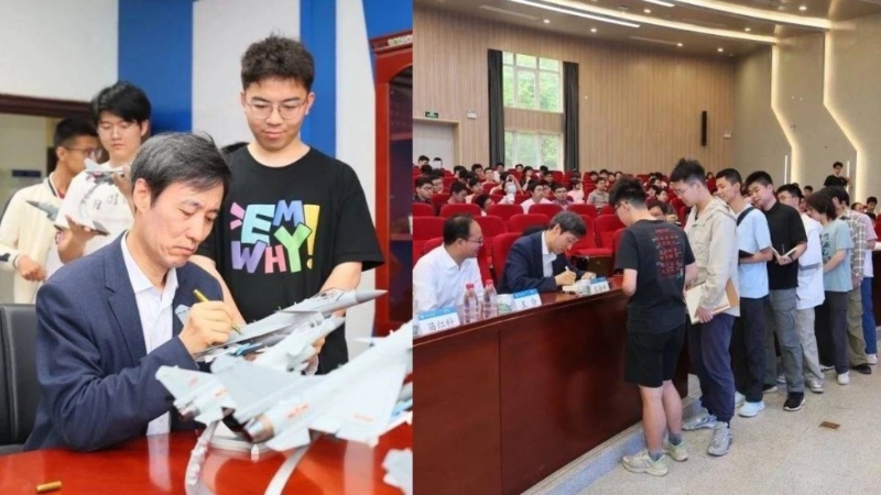 王海峰為同學簽名。