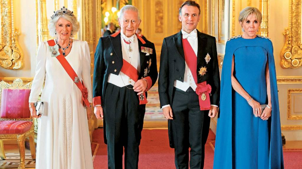 馬克龍夫婦到溫莎堡出席國宴,獲英皇查理斯三世伉儷歡迎。 法新社 馬克龍夫婦到溫莎堡出席國宴,獲英皇查理斯三世伉儷歡迎。 法新社