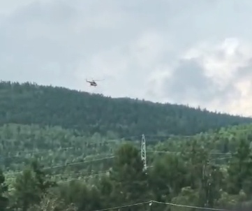 直升機正在對失聯客機進行搜尋 直升機正在對失聯客機進行搜尋